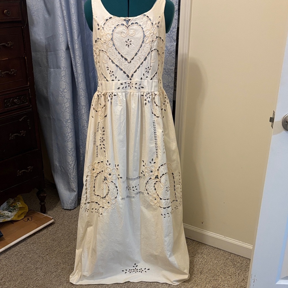 Elegant Cream Maxi Dress with Heart Cut-Outs